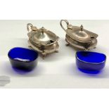 2 silver mustard pots with blue glass liners