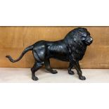 Large bronze lion figure