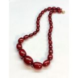 Cherry amber / bakelite bead necklace good internal streaking measures approx 52cm long grduated bea
