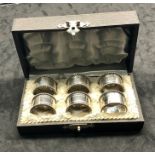 Boxed set of 6 numbered Dutch silver napkin rings Dutch silver sword hallmark each with number meas