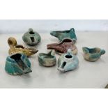 Collection of 8 12th /13th century islamic persian glazed pottery oil lamps