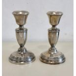 Pair of silver candle sticks Birmingham silver hallmarks height approx 14cm filled bases