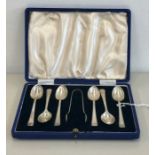 Cased set of 6 silver tea spoons and sugar tongues