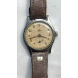 Vintage gents Smiths Deluxe wristwatch the watch winds but does not tick balance will spin no warra