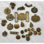Selection of military items includes badges buttons and royal Leicestershire belt buckle