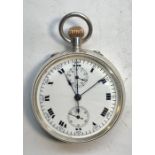 Silver centre second chronograph pocket watch winds and ticks but no warranty given in good overall