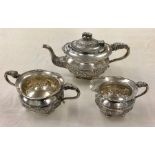 Fine Siver Indian three piece teaset elephant handles embossed scenes .Krishniah Chetty and Sons we