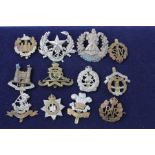 12 WW1 onwards military cap badges Inc Scottish, Hussars, Welch Etc