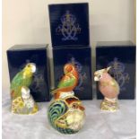 4 boxed royal crown derby paperweights includes amazon green parrot , lorikeet ,pw cockatoo ,and far
