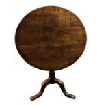 Tilt top table measures approx height 28" diameter 32"