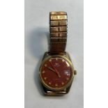 Vintage gents Technos Titan automatic wristwatch the watch winds and ticks but no warranty given me