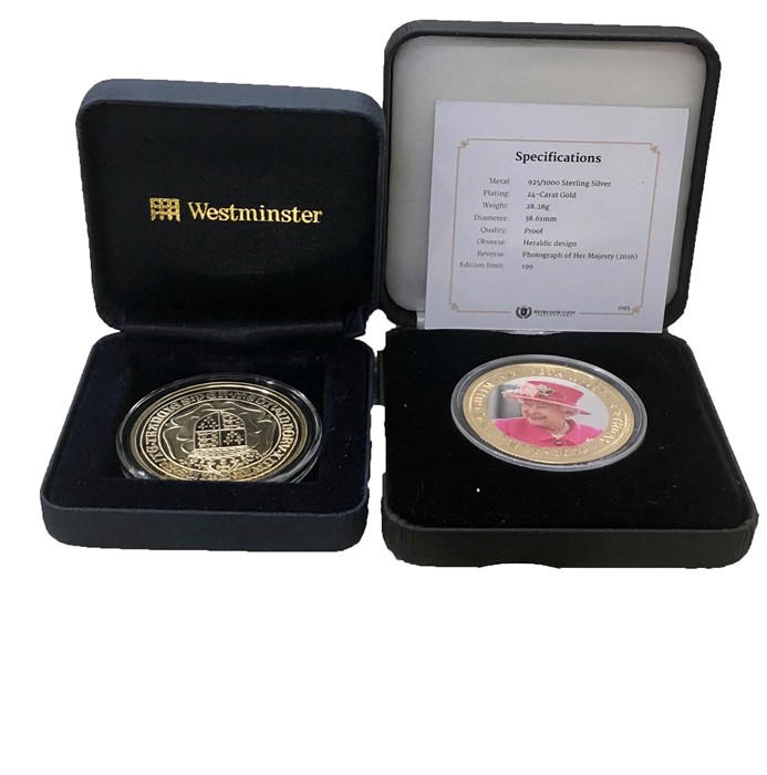 2 boxed silver proof collectors coins, with a small gold 1 crown coin and silver 50 pence