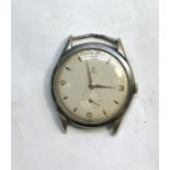 Vintage gents Omega wristwatch head the watch winds and ticks but no warranty given measures approx