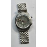 Vintage Gents stainless steel Omega automatic Chronostop Geneve wristwatch the watch winds and tick
