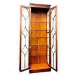 2 Door narrow glass display cabinet measures approx Height 79" Width 24" Depth 13.5"