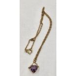 Gold amethyst coloured stone pendant and chain