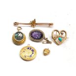 Collection of antique gold jewellery mourning brooches and pendants