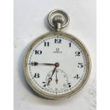 Silver Omega open pocket watch it winds and ticks but no warranty given nickel case in good overall