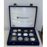 Boxed collection of silver, gold plated 5 pounds and collectors coins