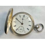 Silver fulll hunter pocket watch by American watch Co winds and ticks but no warranty given in good