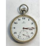 Omega pocket watch winds and ticks but no warranty given in good overall condition measures approx 4