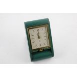 Vintage Jaeger Le Coultre 8 day travel alarm clock, contained with green leather travel case, caseba