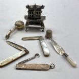 selection of miniature and small silver items