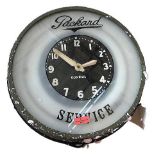 Wall Clock with label Packard ServiceWanduhr mit der Aufschrift «Packard Service».In gutem