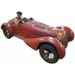 Model of a racing car with driver. Resin Modell eines Rennautos mit Fahrer. Harz