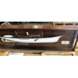 An extremely fine builder’s mirror backed half model of the schooner rigged steam yacht RonaEin sehr