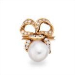 A pearl and diamond dress ring.