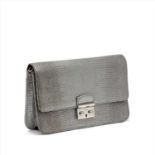 Christian Dior - a silver embossed leather handbag.