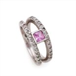 A pink sapphire and diamond ring.