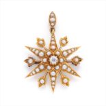 A late 19th century diamond and seed pearl star brooch.