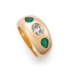 Bulgari - an 18ct gold emerald and diamond ring.