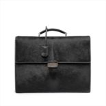 Salvatore Ferragamo - a pony skin and black leather briefcase.
