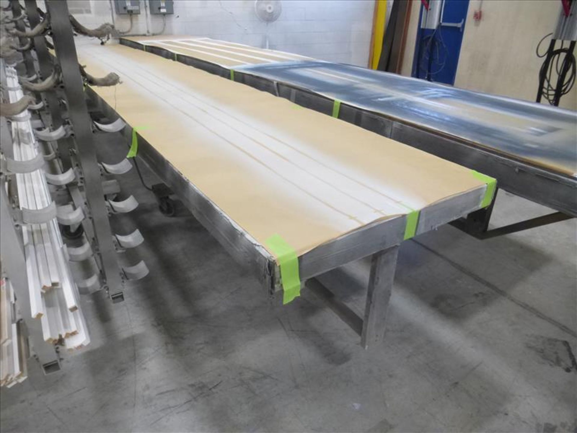 (5) long paint booth tables on casters (delayed removal applies)