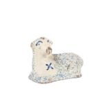 An earthenware figure of a blue speckled sheep, English, 18th century