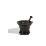 A bronze mortar dated 1668, English together with a pestle