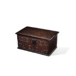 A Commonwealth oak box, the front carved REMEMBER THY END 1659
