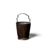 A small Italian bronze facetted bucket with handle, 18th century
