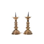A pair of brass pricket candlesticks, German, late 16th / early 17th century
