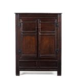 A small Charles II oak two-door panelled cupboard, circa 1680