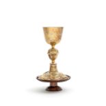 A European gilt metal chalice, late 16th or early 17th century with a further silver-plated chalice