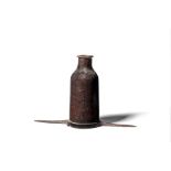 A leather bottle cover, open to the base and with iron prongs, 18th / 19th century