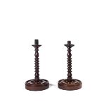 A pair of George III rosewood candlesticks, circa 1780