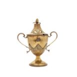 A George III silver gilt cup and cover, by Ebenezer Coker 1775