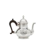 A George I silver pear-shaped teapot of squat baluster form, by John Bache, London, 1723