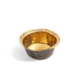 A small brass bowl, 17th century