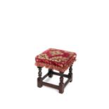 A small Charles I oak stool, circa 1640